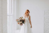 Stunning model showcasing Innocent Chaos faux flower wedding bouquet 
