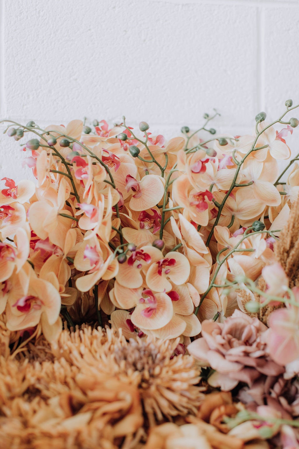 Peach orchid stem, artificial tropical flower stem