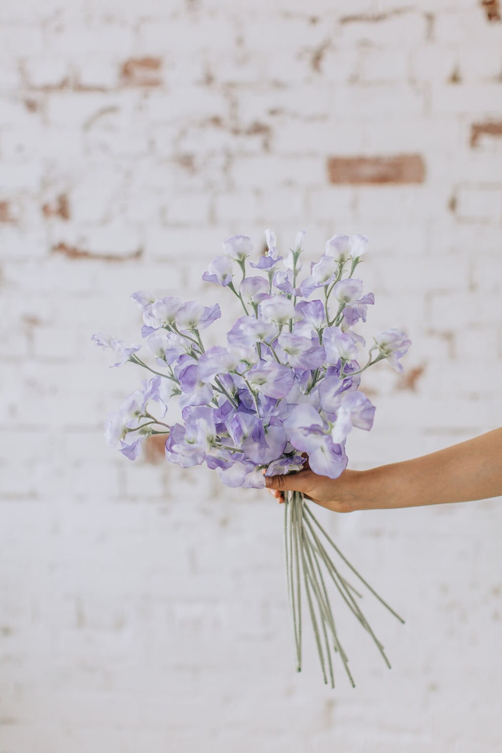 Artificial sweet pea stem spray in purple, single stem