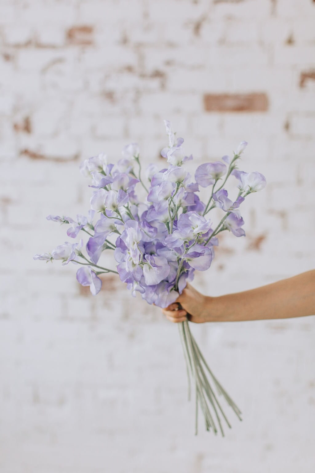 Artificial sweet pea stem spray in purple, single stem