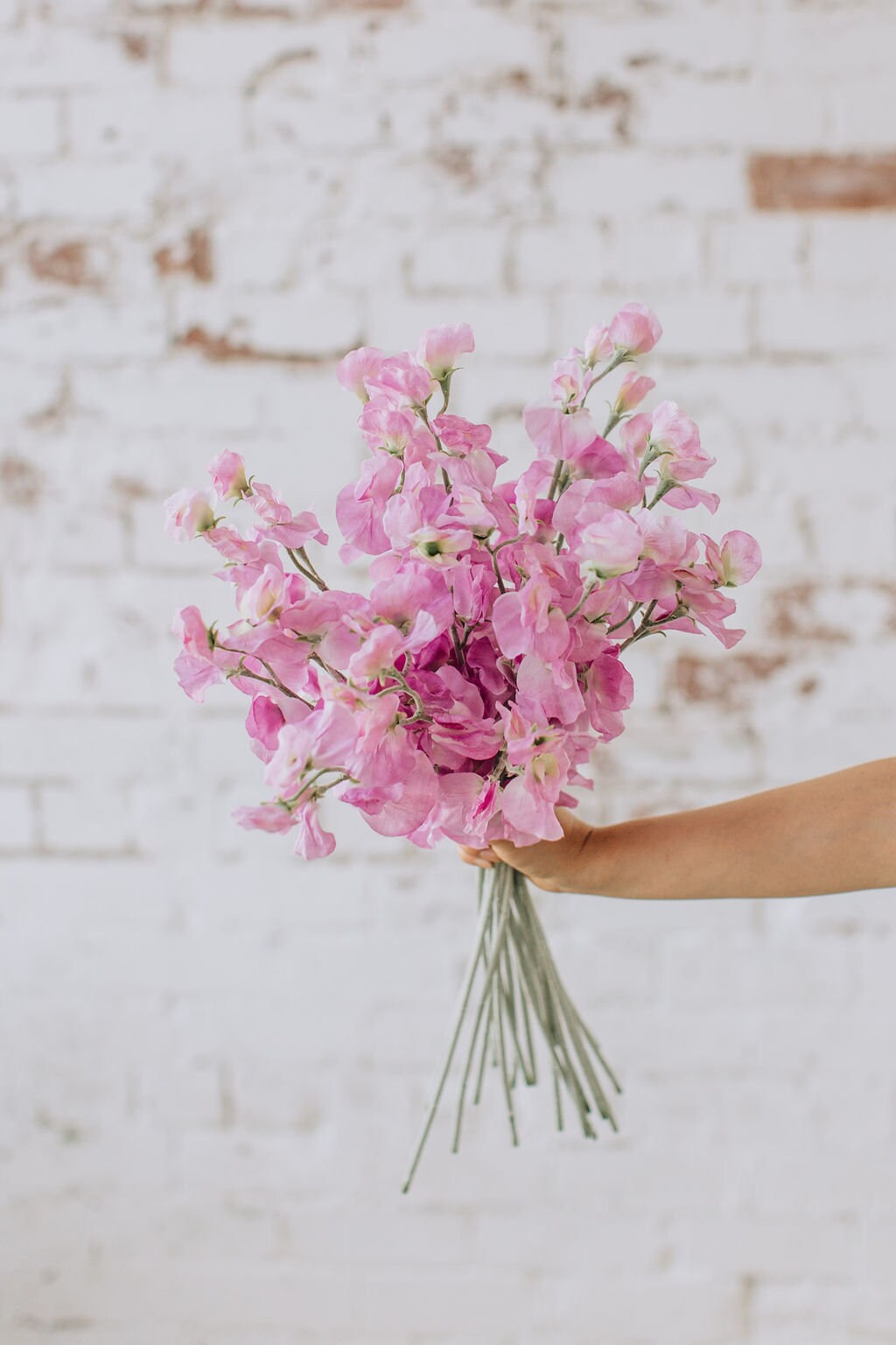 Artificial sweet pea stem spray in pink, single stem