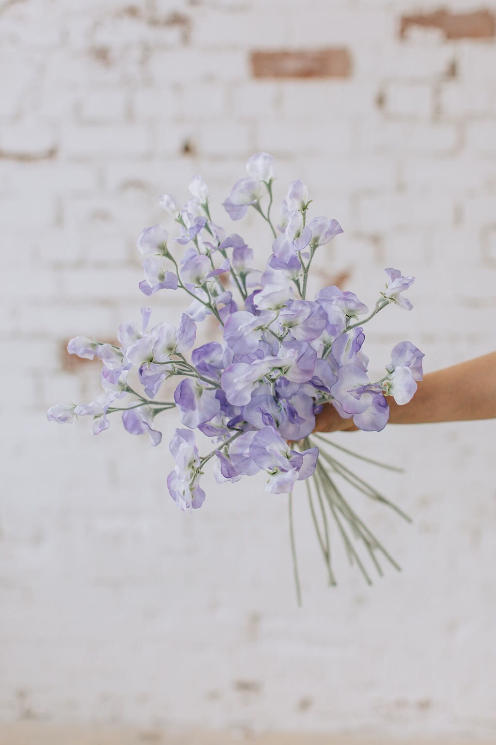 Artificial sweet pea stem spray in purple, single stem