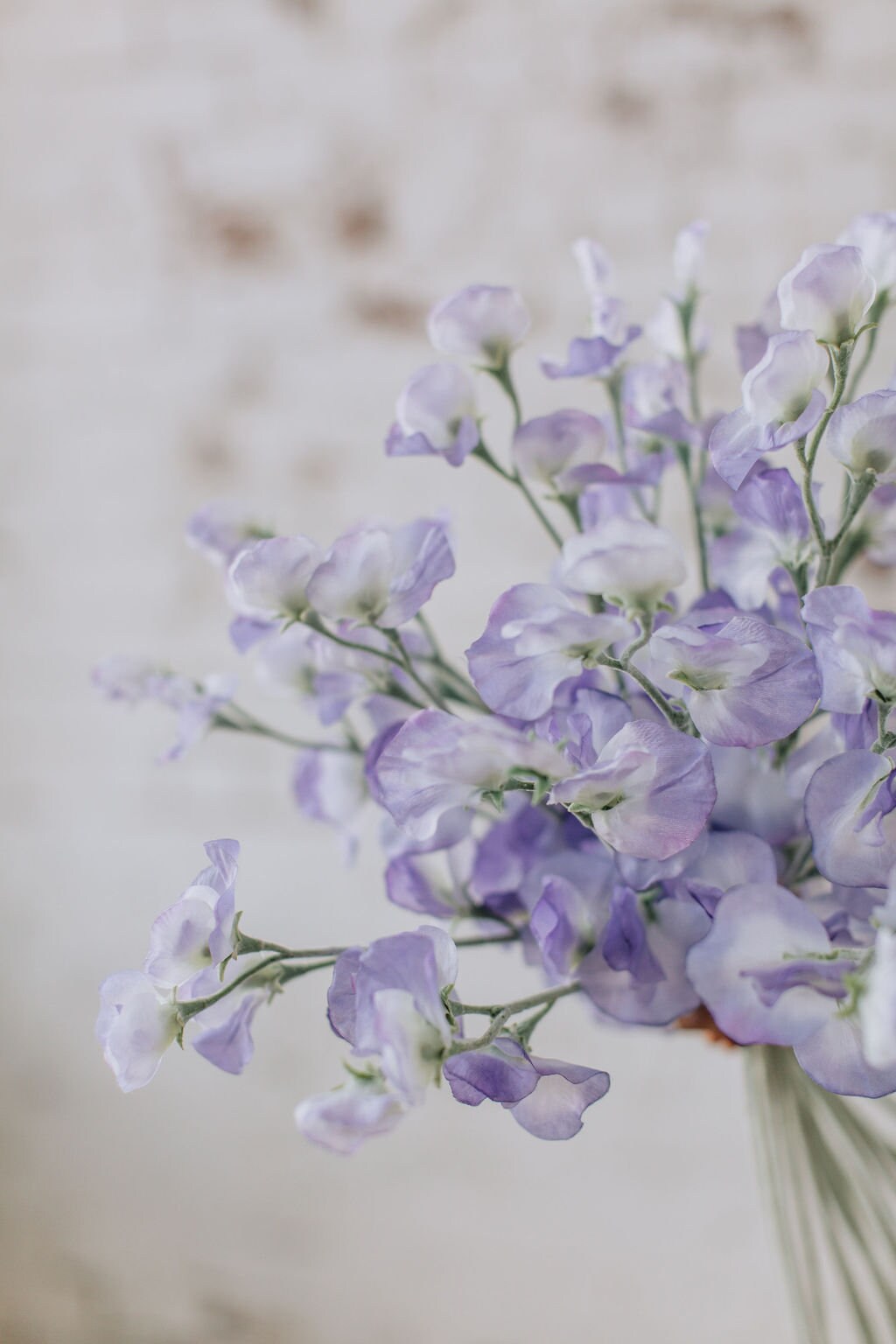 Artificial sweet pea stem spray in purple, single stem