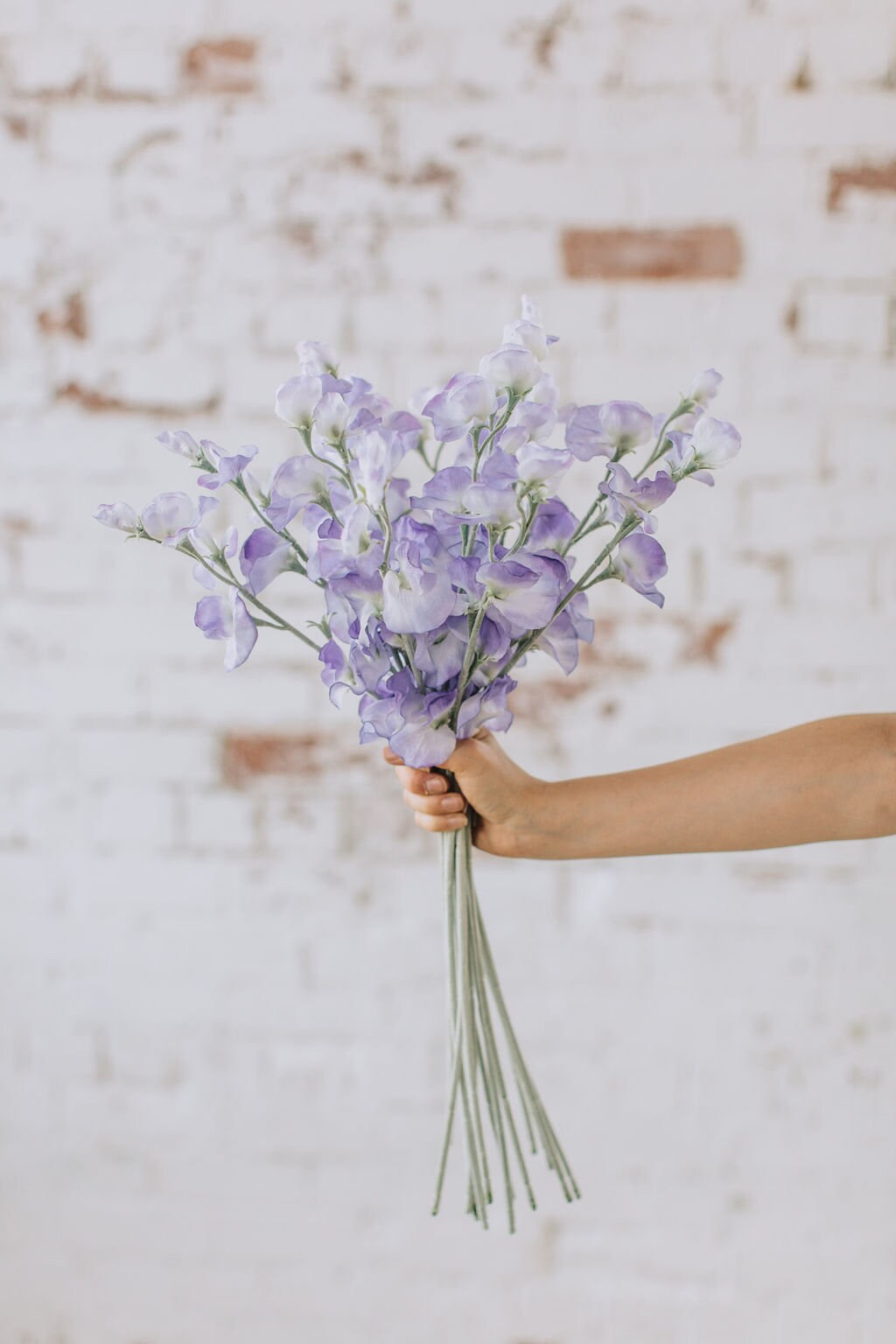 Artificial sweet pea stem spray in purple, single stem