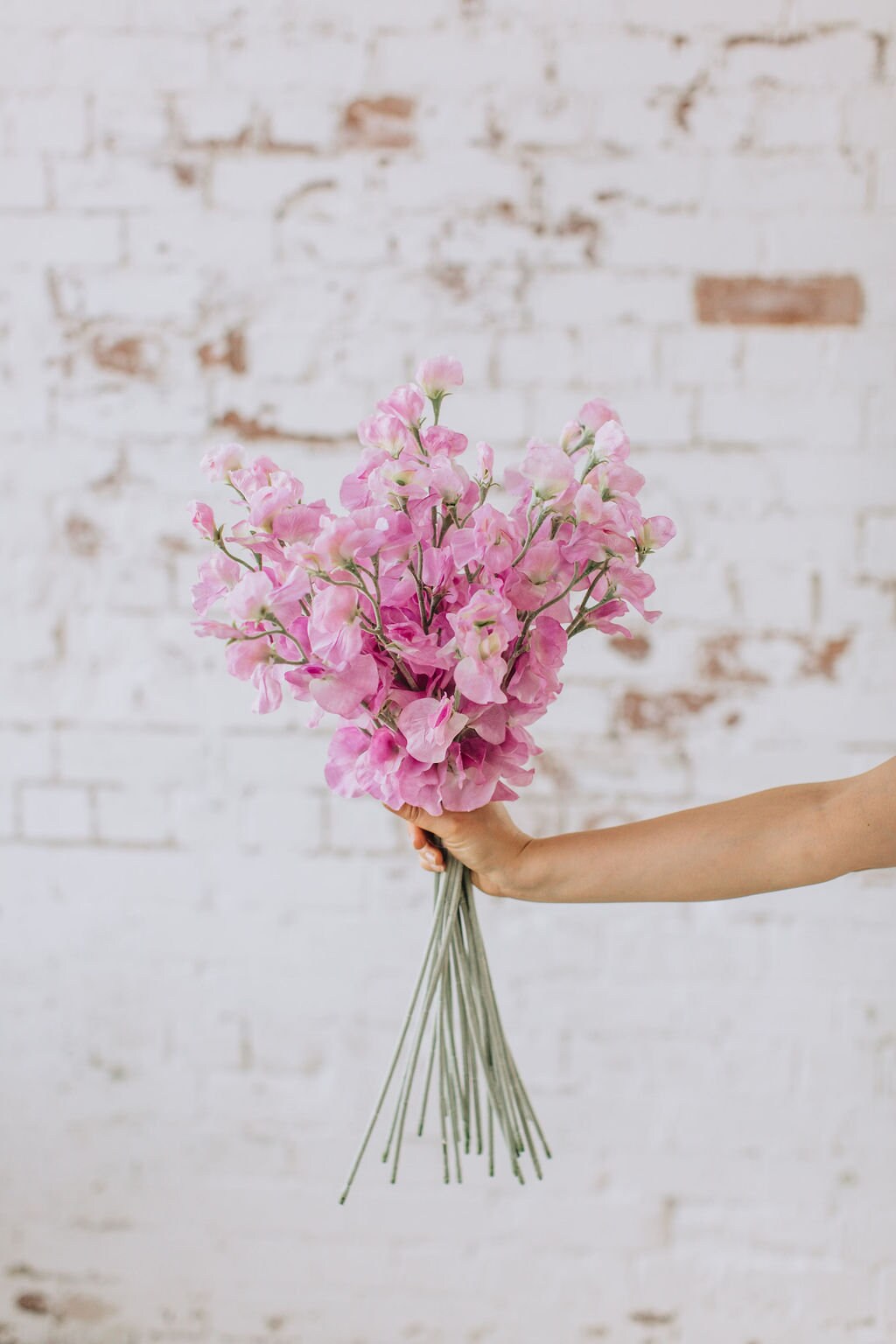 Artificial sweet pea stem spray in pink, single stem