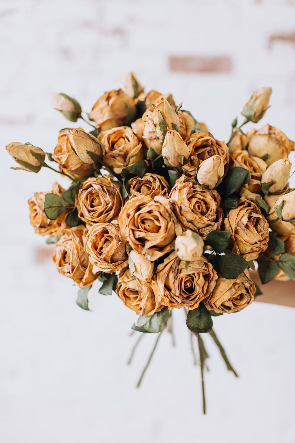 Dry look honey rose spray, single stem faux rose in dirty yellow colour
