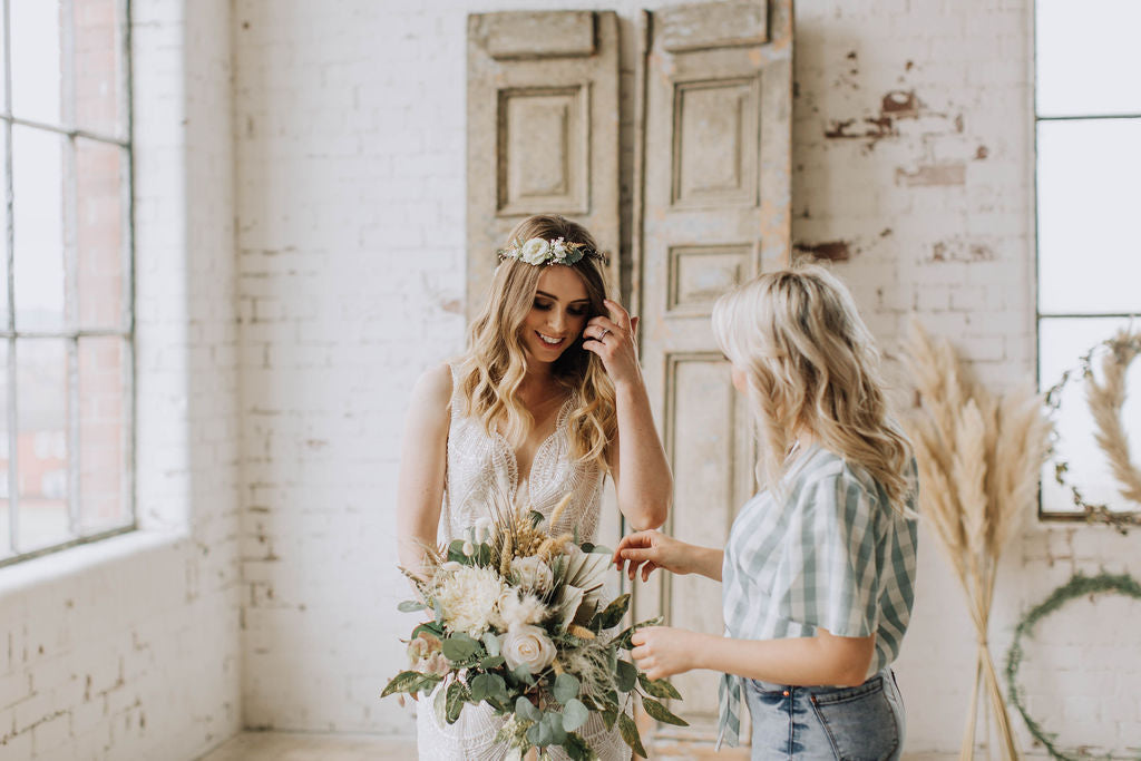 Sharon Hay pictured with model wearing Innocent Chaos bridal crown and stunning handmade ivory and green bridal bouquet 